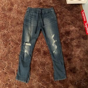 Blue jeans with rips